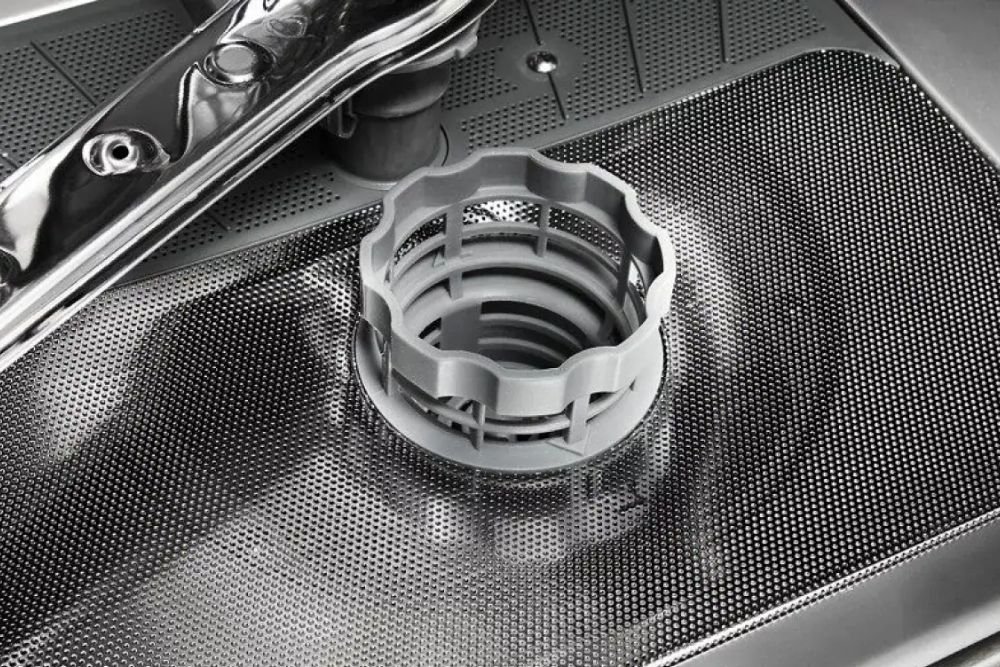 A stainless steel sink equipped with a drain and cover, linked to appliance repair services in Reno, NV.